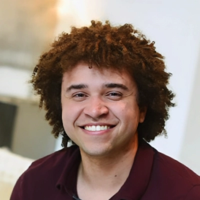 Chiropractor Robert Johnson In Collared Shirt Smiling